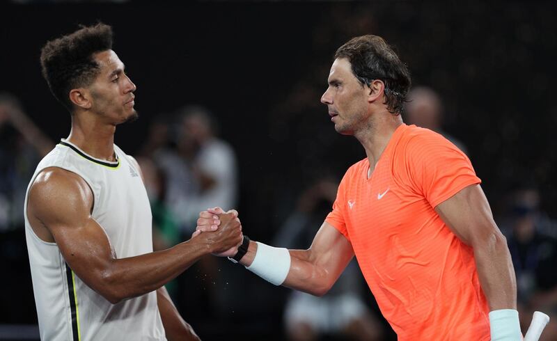 Rafael shakes hands with Michael Mmoh after the match. Reuters