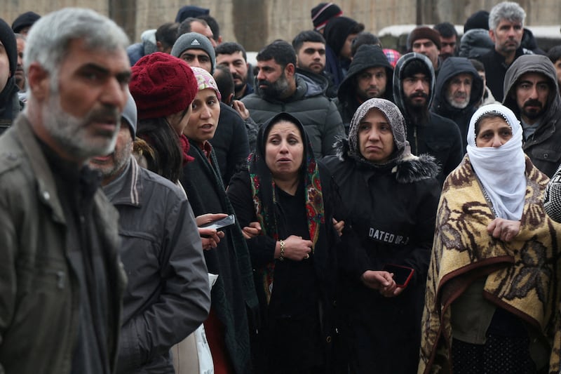 Residents wait anxiously as rescue operations take place in Diyarbakir, Turkey. Reuters