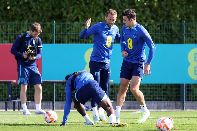 England's Harry Kane and Harry Maguire. Getty