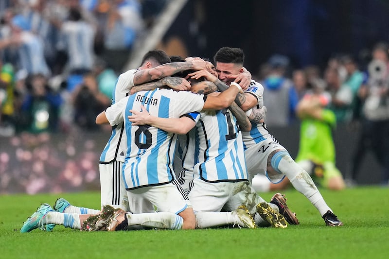 Tearful players collapsed on the pitch in celebrations. AP Photo