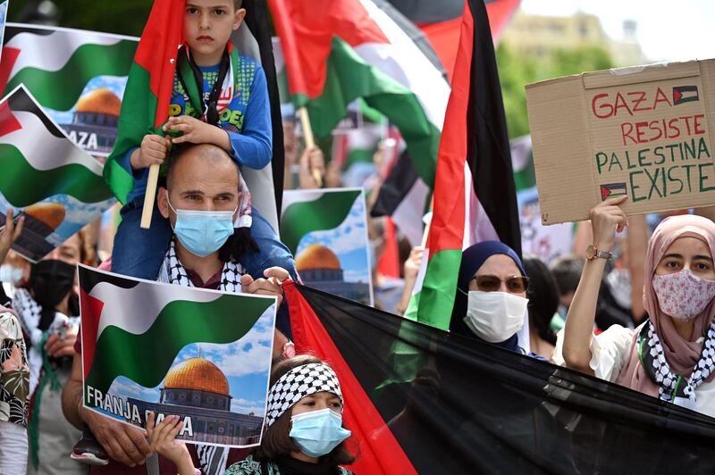 Palestine supporters march in a procession marking the 73rd anniversary of the Nakba in Madrid. AFP