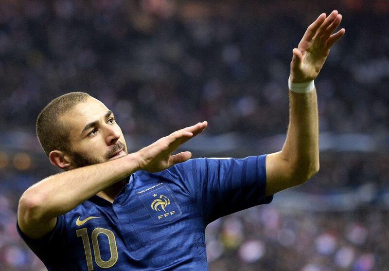 France 3-0 Finland. Karim Benzema scored and the French ended their qualifying campaign with a win, but will enter a play-off after finishing behind Spain. Franck Fife / AFP