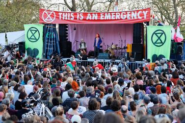 Climate change activist Greta Thunberg addresses crowds during the Extinction Rebellion group's environmental protest camp at Marble Arch in London in May. AFP