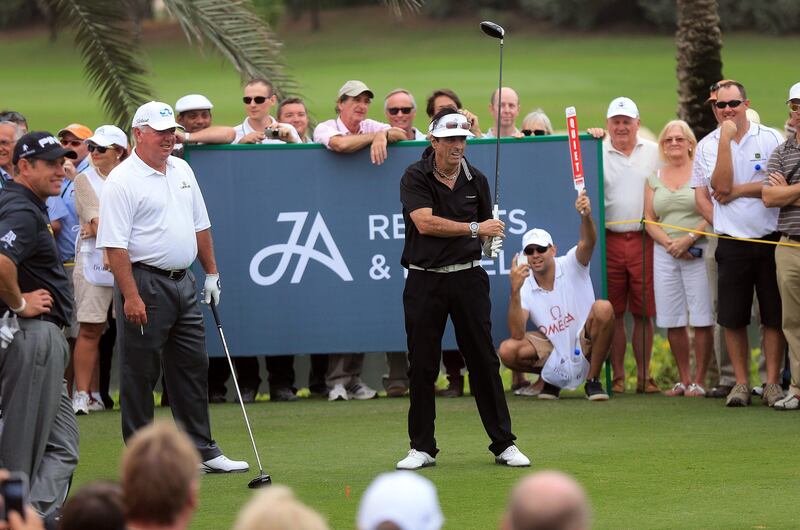 DUBAI, UNITED ARAB EMIRATES - JANUARY 29:  Alice Cooper of the USA the legendary rock star watched by his patner Mark O'Meara of the USA during the Challenge match at The Jebel Ali Hotel and Golf Resort as a preview for the 2013 Dubai Desert Classic on January 29, 2013 in Dubai, United Arab Emirates.  (Photo by David Cannon/Getty Images) *** Local Caption ***  160322621.jpg