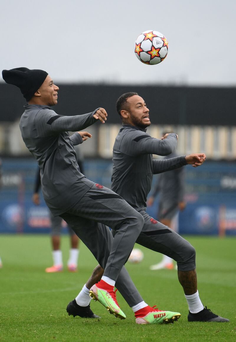 Kylian Mbappe and Neymar at training. AFP