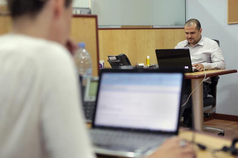 Employees working at Yahoo! Maktoob office in Dubai Internet City. Innovation will be crucial to developing sustainable economic growth. (Nicole Hill / The National)