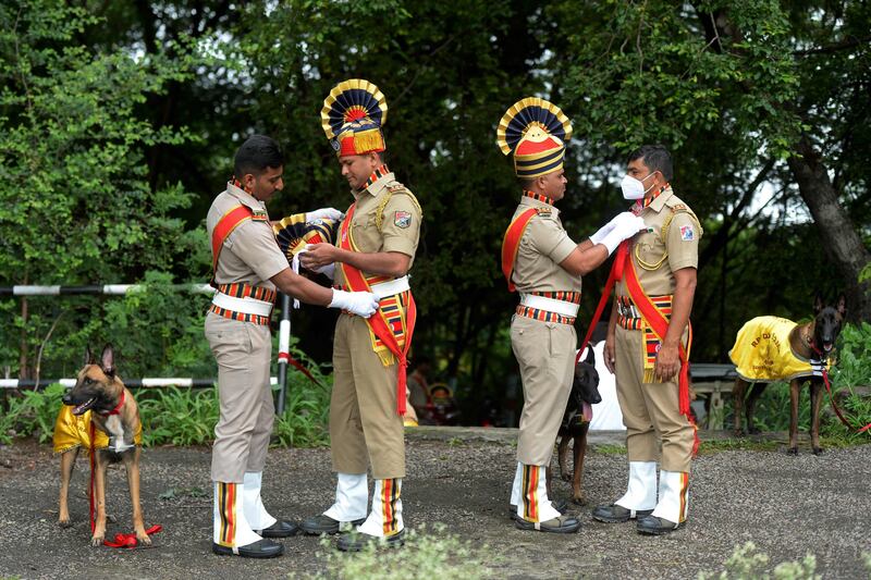 Indian Railway Protection Force dog squad personnel prepare to march to celebrate the country's 75th Independence Day. AFP