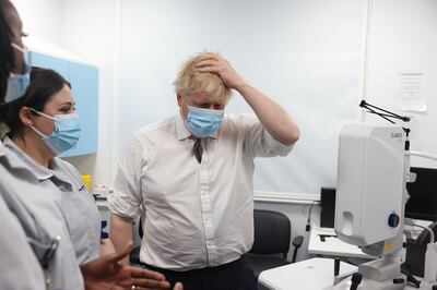 Boris Johnson 'categorically' denied he had any prior knowledge that the May 20 2020 event he attended was a party. Mr Johnson was confronted about Dominic Cummings' claims during a visit to Finchley Memorial Hospital in north London on Tuesday. PA