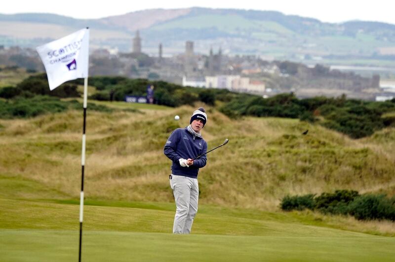Robert MacIntyre chips on to the eighteenth green during Round 1 of the Scottish Championship at Fairmont St Andrews in Scotland on Thursday, October 15.