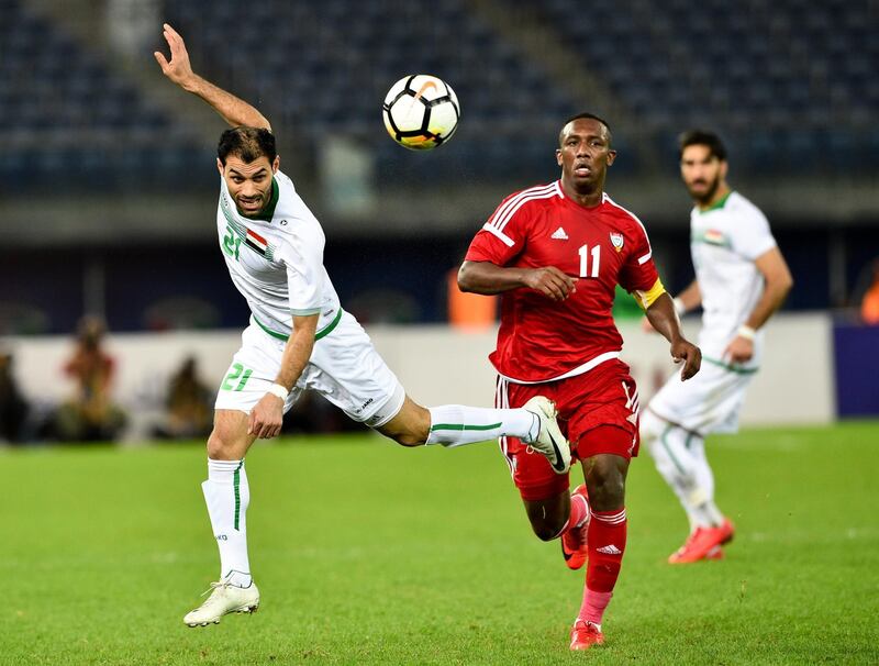 epa06413875 Iraq player Saad Laibi (L) in action against United Arab Emirates player Ahmed Al Attas (R) during the Gulf Cup of Nations soccer semi final match between Iraq and United Arab Emirates at Jaber Al-Ahmad International Stadium, Kuwait City, Kuwait, 2 January 2018.  EPA/Noufal Ibrahim