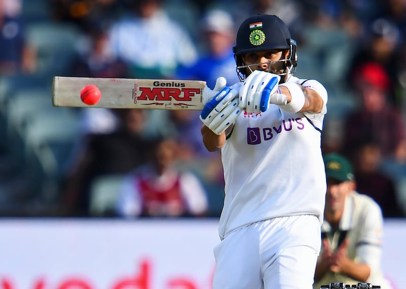 India's captain Virat Kohli plays a shot on the day one of the first cricket Test match between Australia and India in Adelaide on December 17, 2020. (Photo by William WEST / AFP) / --IMAGE RESTRICTED TO EDITORIAL USE - STRICTLY NO COMMERCIAL USE--