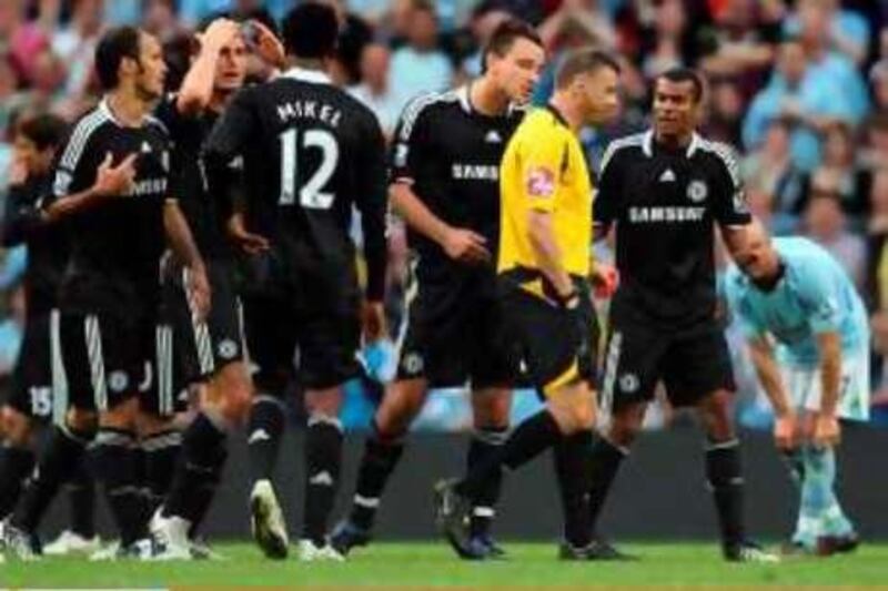 Football - Manchester City v Chelsea Barclays Premier League - The City of Manchester Stadium - 13/9/08
Chelsea's John Terry argues with referee Mark Halsey after being sent off
Mandatory Credit: Action Images / Carl Recine
Livepic

NO ONLINE/INTERNET USE WITHOUT A LICENCE FROM THE FOOTBALL DATA CO LTD. FOR LICENCE ENQUIRIES PLEASE TELEPHONE +44 (0) 207 864 9000. *** Local Caption ***  spt_ai_mancityvchelsea_47.jpg