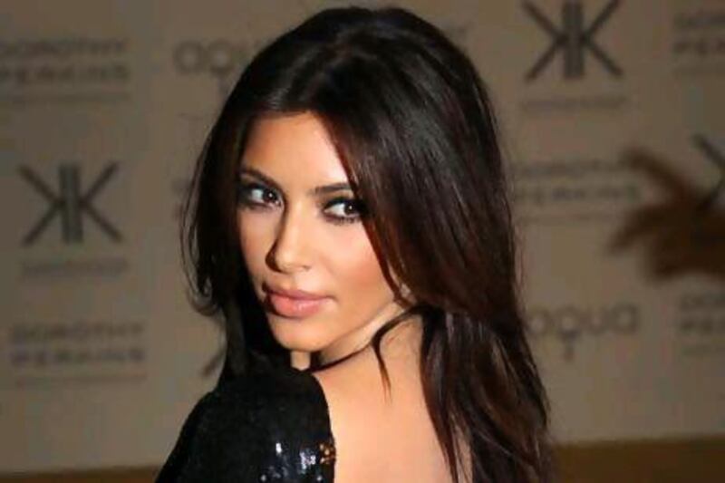 Kim Kardashian removes and apologises for tweets about Israel and Gaza. Joel Ryan / Invision / AP Photo