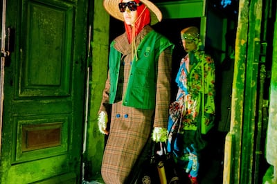 Capturing the contradiction at the heart of Gucci cruise, a look of tweed and mittens, is followed by a lightweight dress made from floral scarves