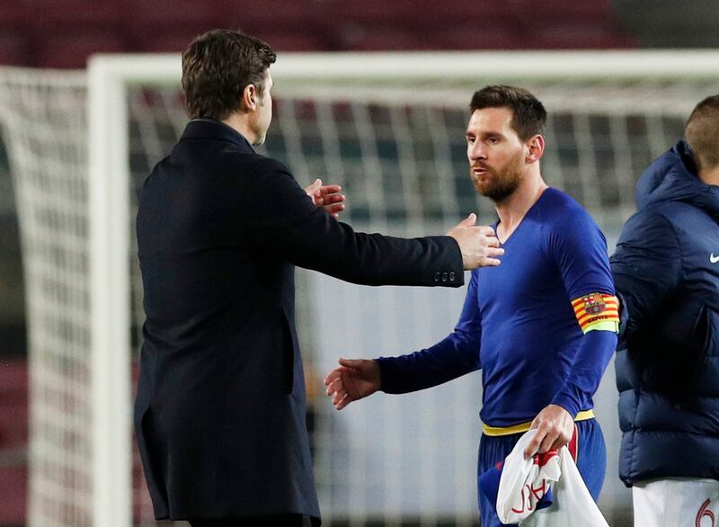 Messi with Paris St Germain coach Mauricio Pochettino after the match. Reuters