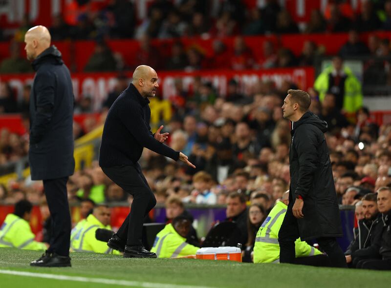 Manchester City manager Pep Guardiola remonstrates with the fourth official. Reuters