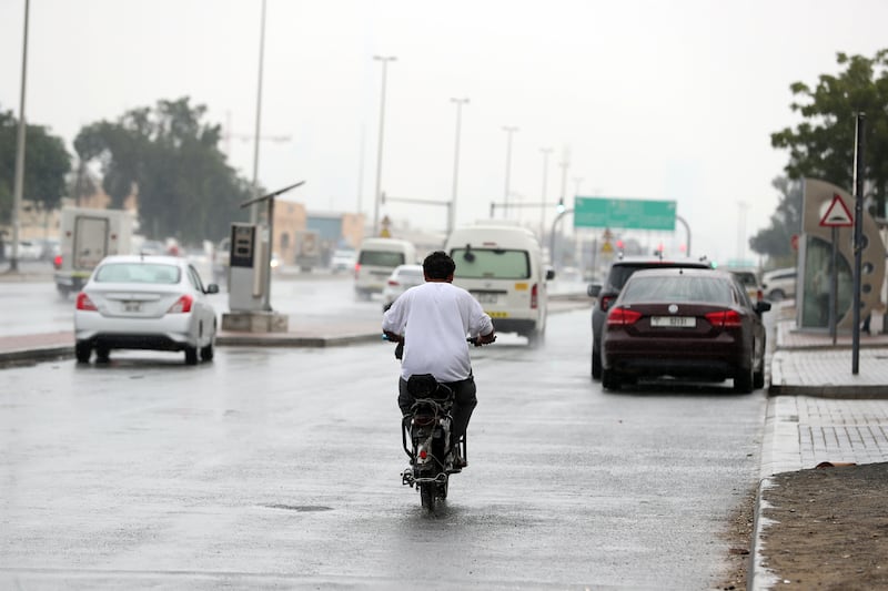 The rain slows traffic in Al Quoz. Chris Whiteoak / The National