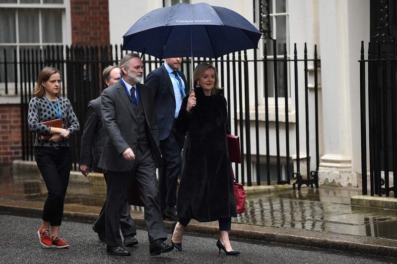 Britain's Foreign Secretary Liz Truss arrives at 10 Downing Street to attend a meeting of the UK's Cobra emergency committee. AFP