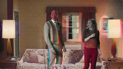 Paul Bettany is Vision and Elizabeth Olsen is Wanda Maximoff in marvel Studios' WandaVision. Courtesy Disney+