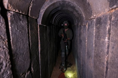 An Israeli soldier in a tunnel beneath Al Shifa Hospital in Gaza city. Reuters
