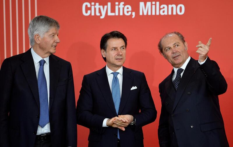 Italian Prime Minister Giuseppe Conte, centre, is flanked by Generali chairman Gabriele Galateri di Genola, left and CEO Philippe Donnet as they attend the Generali Tower inauguratio, EPA