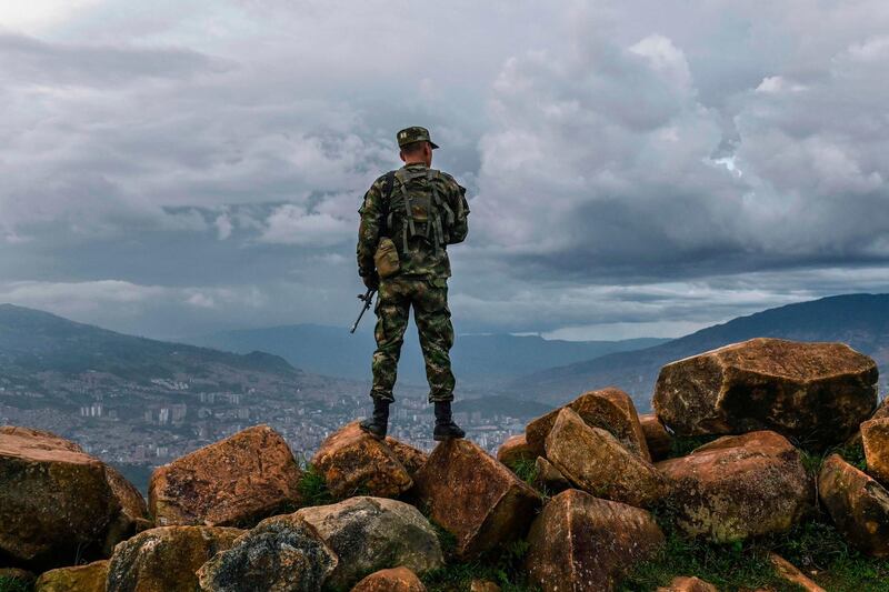 A Colombian soldier stands guard in the outskirts of Medellin, Antioquia department, Colombia. AFP