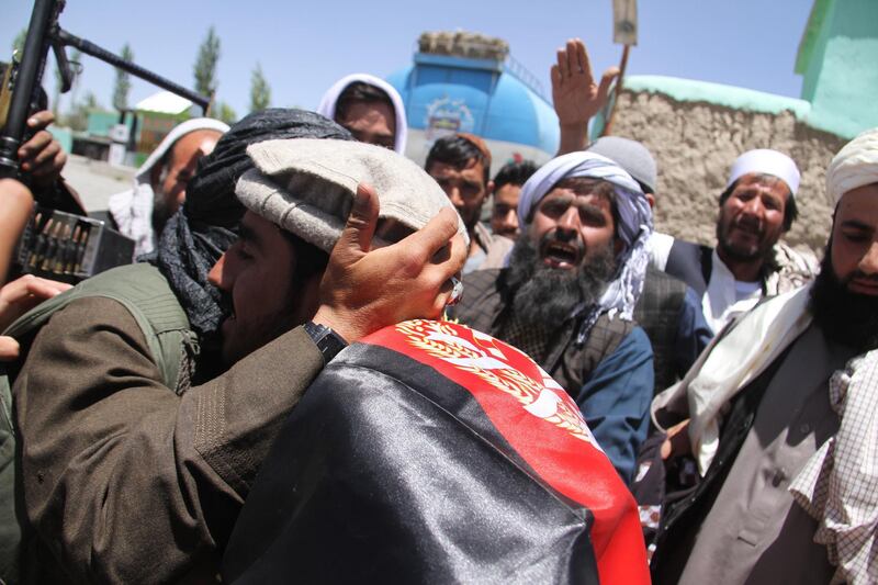 Alleged Taliban militants meets Afghan people as a group of Taliban visits to greet people as a goodwill gesture amid a three-day ceasefire on second day of Eid al-Fitr, in Ghazni, Afghanistan, on June 16, 2018. STR / EPA