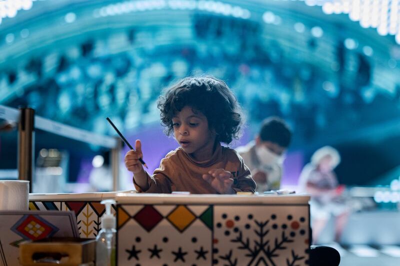 A child drawing outside the Saudi Arabia pavilion. All photos: Expo 2020 Dubai