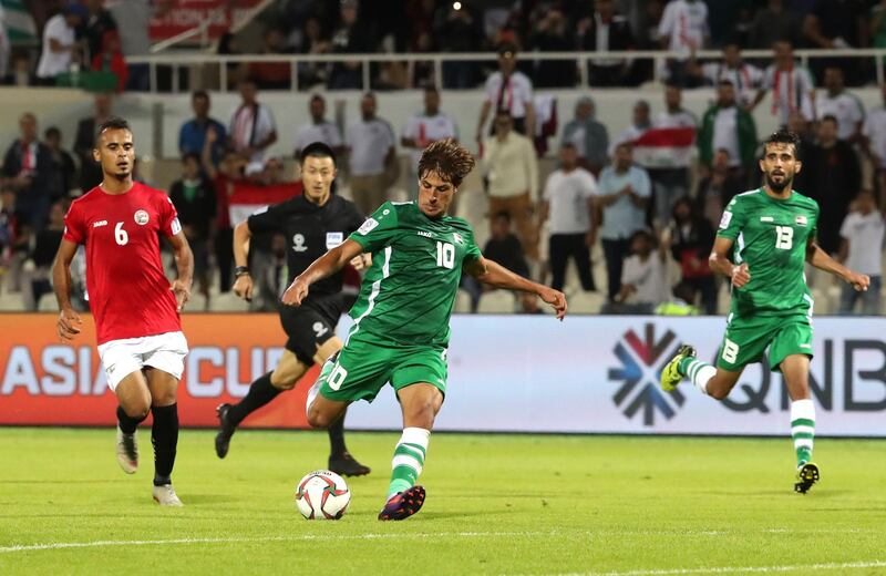Iraq forward Mohanad Ali Kadhim Alshammari shoots at goal. AFP