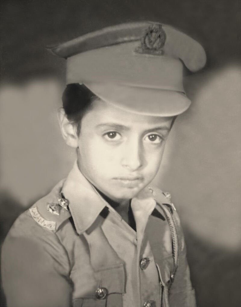 Sheikh Mohamed dressed in military uniform at the age of about 10, in the 1960s. Sheikh Mohamed has spent his entire life in the service of his country. Photo: National Archives