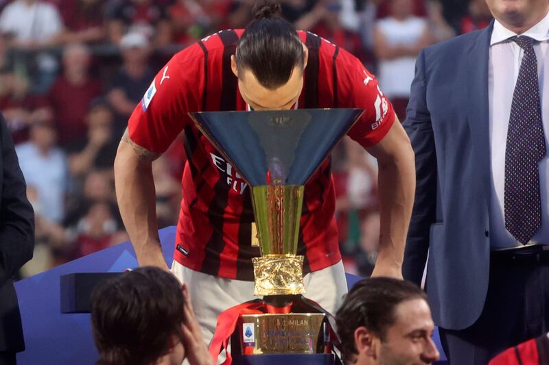 Zlatan Ibrahimovic celebrates with the Serie A trophy. AP
