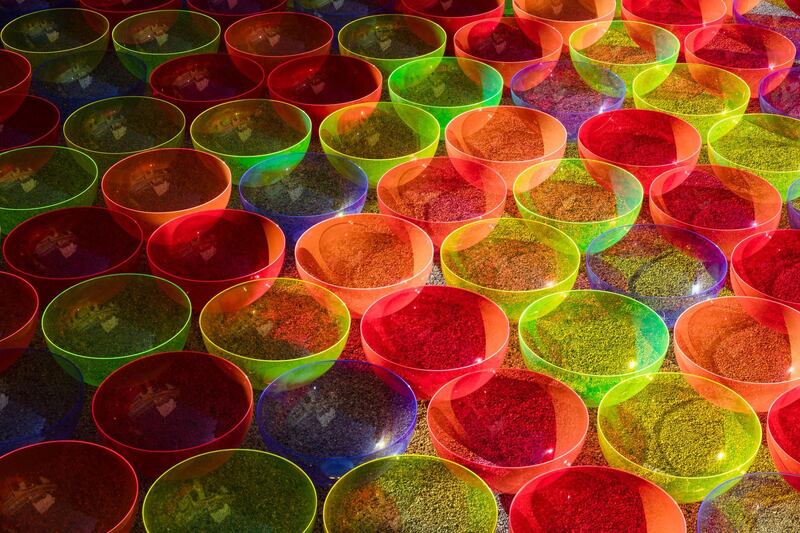 Liz West’s Aglow installation will consist of of 169 hemispherical, ﬂuorescent-coloured acrylic bowls and be found nestled between buildings 8 and 9 in D3. Courtesy Liz West