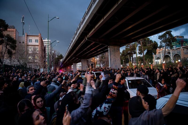 Demonstrators chant while gathering during a vigil for the victims of the Ukraine International Airlines flight that was unintentionally shot down by Iran, in Tehran, Iran. Bloomberg