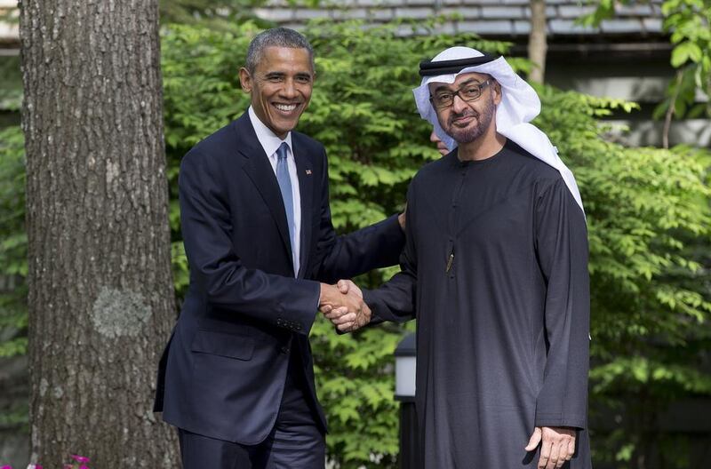 Sheikh Mohammed bin Zayed stands for a photo with US president Barack Obama after attending the US-GCC Summit at Camp David. Ryan Carter / Crown Prince Court - Abu Dhabi / May 14, 2015