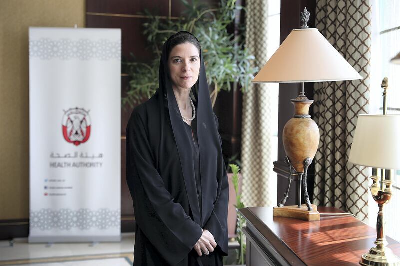 ABU DHABI , UNITED ARAB EMIRATES , AUG 27 – 2017 :- Dr Maha Taysir Barakat , Director General of the Health Authority , Abu Dhabi at her office in the Abu Dhabi Healthcare Authority building in Abu Dhabi. ( Pawan Singh / The National ) Story by Nick Webster