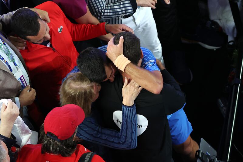 Novak Djokovic celebrates with his team and family. Getty 