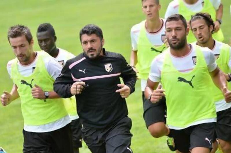 Gennaro Gattuso, centre, is in his second coaching job in less than a year. Tullio Puglia / Getty Images