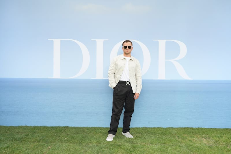 Welsh actor Taron Egerton attends the Dior Homme photocall. Getty Images For Christian Dior