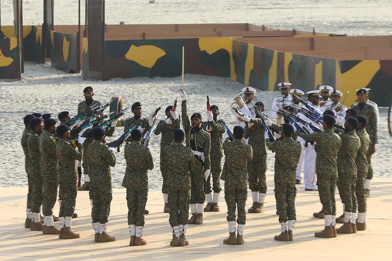 Members of Pakistan's navy at the exhibition. EPA