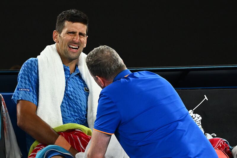 Novak Djokovic receives attention during a medical time out. Getty