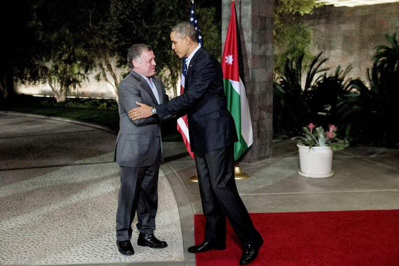 President Barack Obama greets King Abdullah II of Jordan in California earlier this month. Brendan Smialowski / AFP