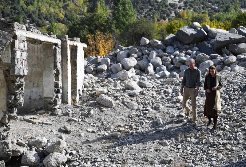Britain's William (L) and Catherine (R), Duke and Duchess of Cambridge visit flood ruins in the village of Bumburet in the Chitral District of Khyber-Pakhunkwa Province in Pakistan. EPA