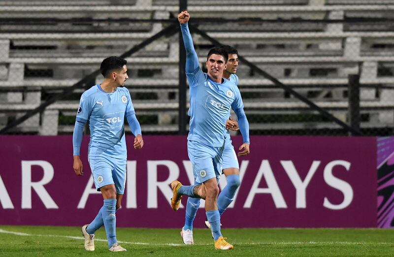 Uruguay's Torque Argentine Gustavo Del Prete (C) celebrates after scoring a penalty against Argentina's Independiente during the Copa Sudamericana football tournament group stage match at the Parque Viera Stadium in Montevideo, on May 11, 2021. (Photo by PABLO PORCIUNCULA / POOL / AFP)