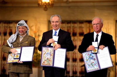 OSLO, NORWAY - 1994:  In this handout from the Government Press Office, (R-L) Israeli Prime Minister Yitzak Rabin, Israeli Foreign Minister Shimon Peres and Palestinian leasder Yaser Arafat, the joint Nobel Peace Prize winners for 1994, in Olso, Norway. (Photo by Government Press Office via Getty Images)