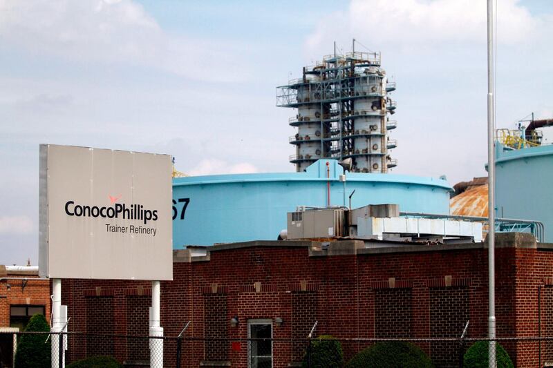 (FILES) In this file photo a sign stands in front of the ConocoPhillips oil refinery May 1,2012 in Trainer, Pennsylvania. US petroleum giant ConocoPhillips announced on October 19, 2020 it would acquire Texas-based shale oil rival Concho Resources in a transaction valued at $9.7 billion. The acquisition comes as global oil giants have struggled in recent months amid the Covid-19 pandemic that caused a slowdown in the global economy and a plunge in the price of crude.
 / AFP / GETTY IMAGES NORTH AMERICA / Jessica Kourkounis
