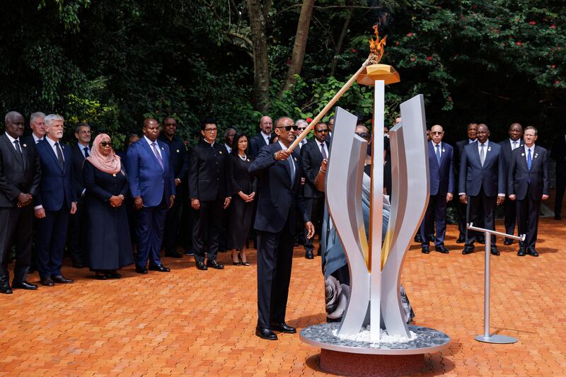 The President of Rwanda, Paul Kagame, lights a flame to begin 100 days of remembrance of the Rwanda genocide in 1994. Getty Images