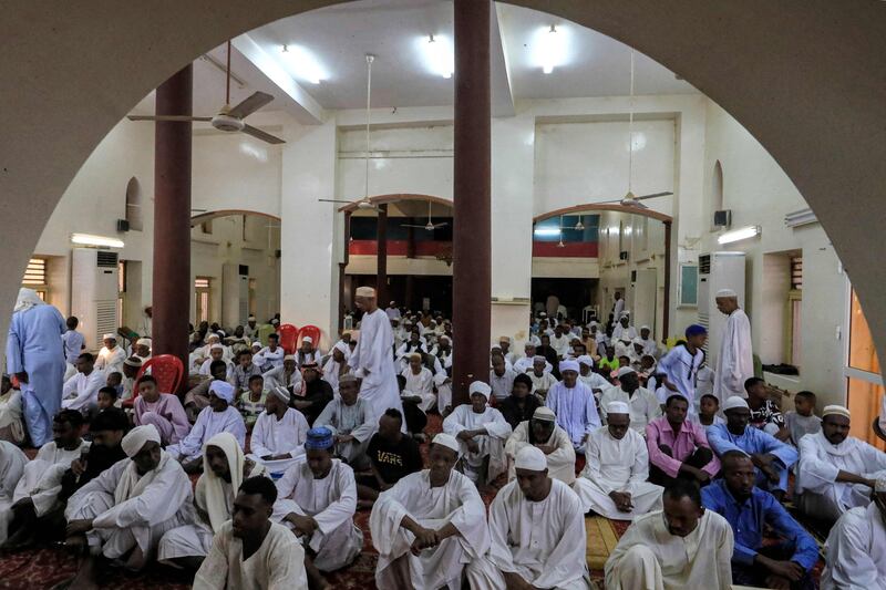 The faithful come together in the mosque to mark Eid