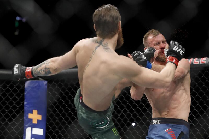 Conor McGregor lands a kick to the face of Donald Cerrone. Reuters