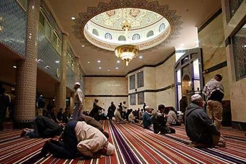 American Muslim leaders are trying to open Islamic centres and mosques around the United States, and often face vocal opposition. Above, prayers at the King Fahd Mosque near Los Angeles.