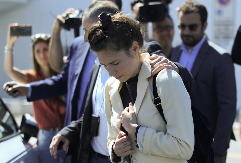 Amanda Knox, a former American student who was accused and then acquitted of the murder of her roommate British student Meredith Kercher and visits Italy for the first time since those events to speak at the Criminal Justice Festival, arrives at Milan's Linate airport, Italy, June 13, 2019. REUTERS/Daniele Mascolo     TPX IMAGES OF THE DAY
